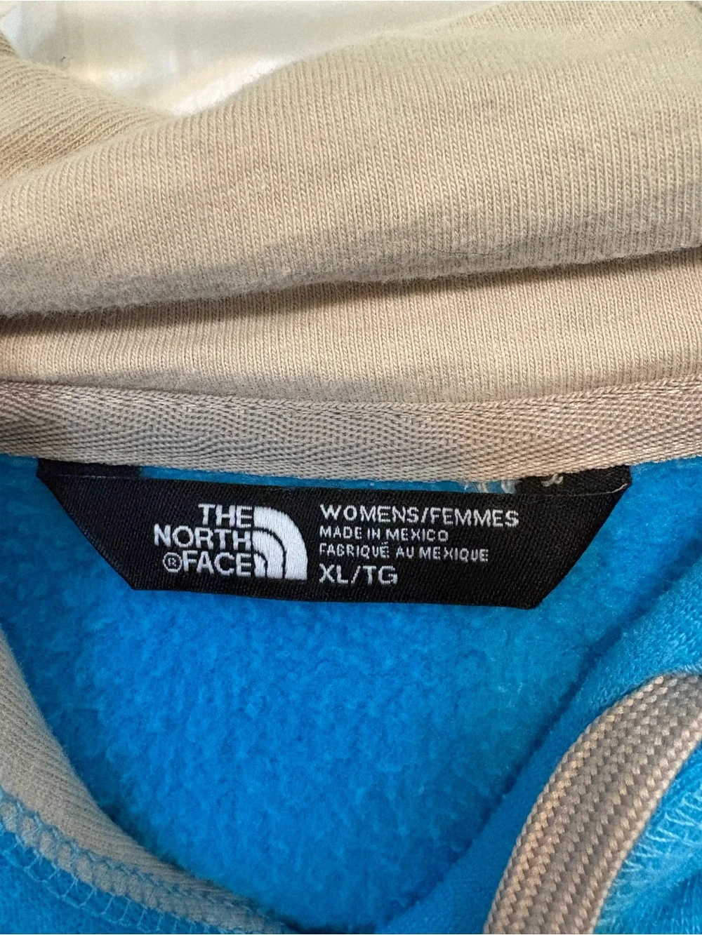 The North Face Turquoise Pullover Hoodie with Cream Logo
